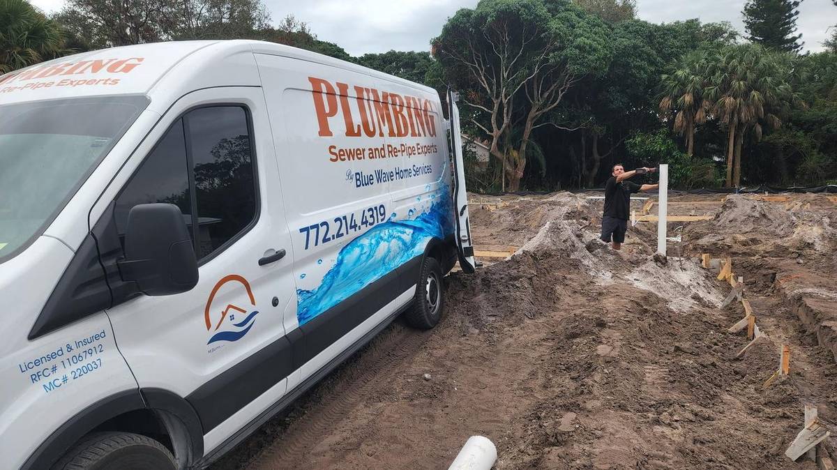 Blue Wave Home Services van on a Palm City job site
