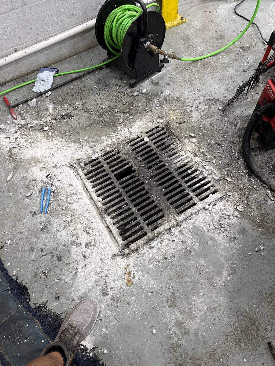 Commercial floor drain hydro jetting and drain cleaning by Blue Wave Home Services