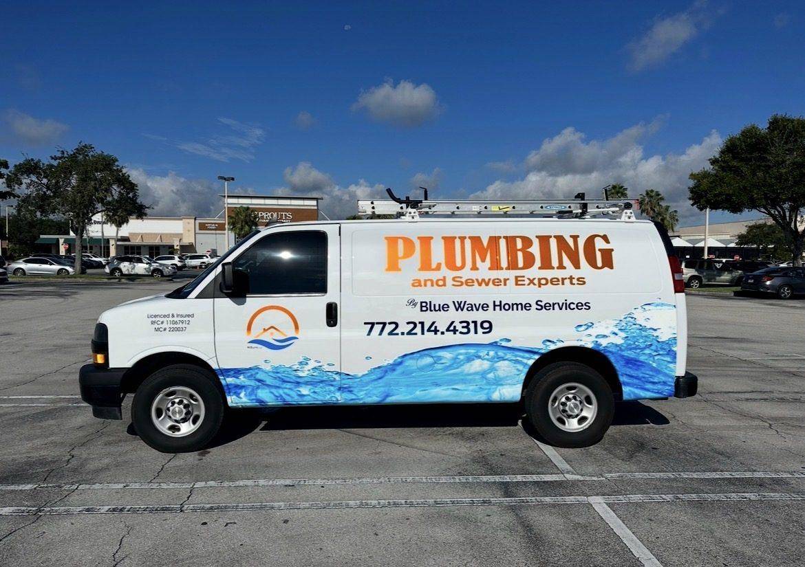 Blue Wave Home Services branded plumbing van