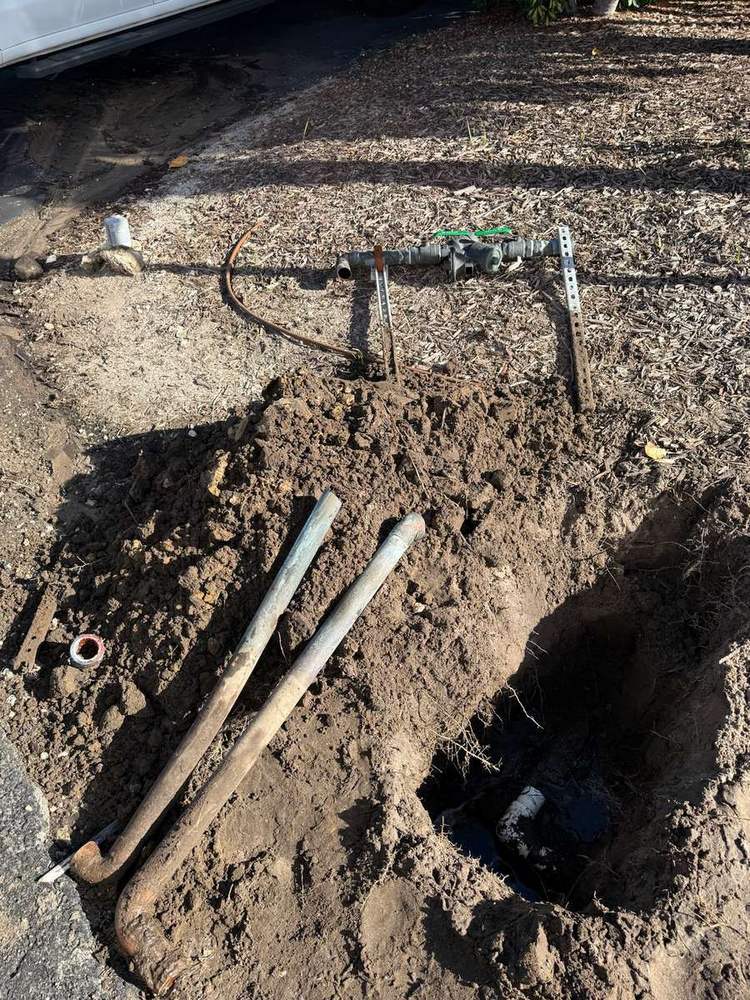 Water service line excavation and new main installation in Palm City, FL — photo 1