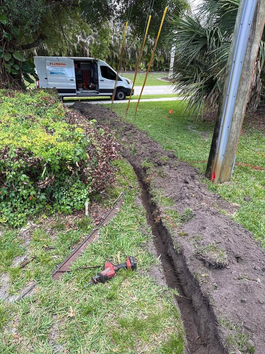 Plumber connecting a home to city water service in Palm City, FL